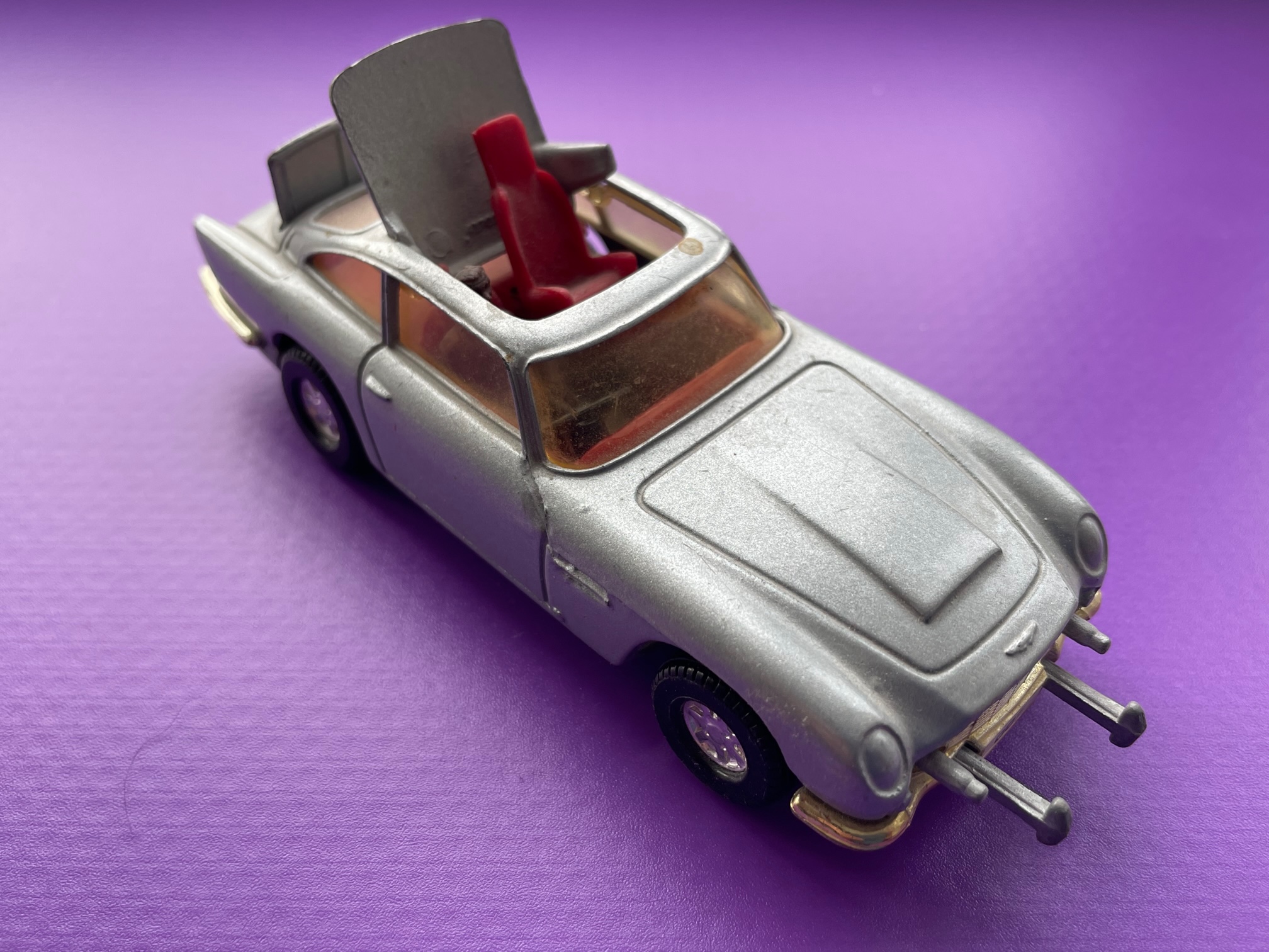 Photograph of model of grey James Bond's Aston Martin.